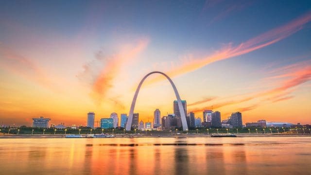 St. Louis, Missouri, USA downtown cityscape on the Mississippi River at twilight.