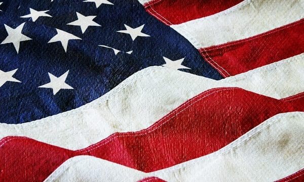Detail of an American flag with a canvas and paint texture