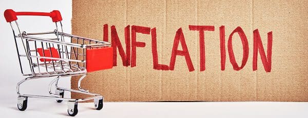Consumers inflation concept, Rising living costs, Shopping trolley and word inflation