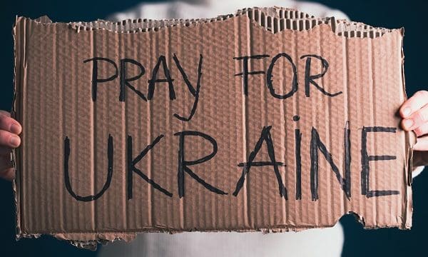 Pray for Ukraine concept background. Concept symbol of help support and no war in the country of Ukraine.