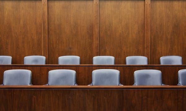 Empty Jury Seats in Courtroom