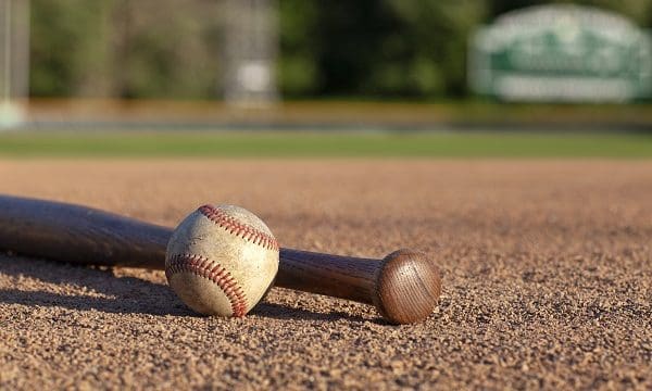 Baseball and bat low angle selective focus view on a baseball field