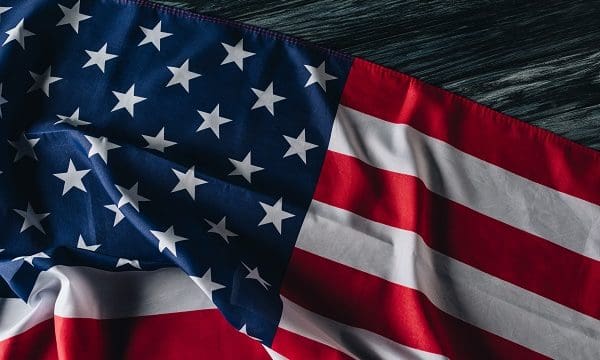 american national flag on grey wooden surface, memorial day concept