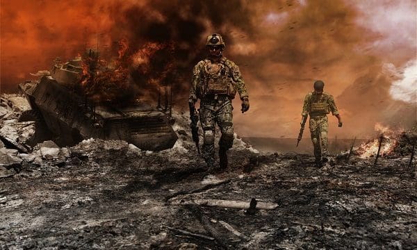 Members of Navy SEAL Team with weapons in action