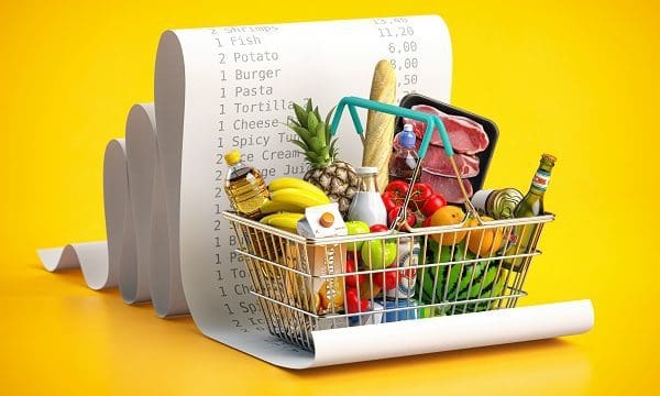 Shopping basket with foods on receipt. Grocery expenses budget, inflation and consumerism concept. 3d illustration