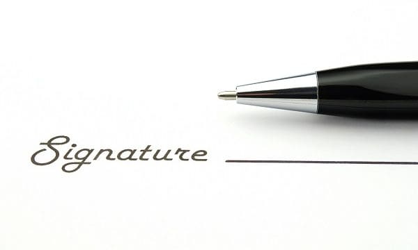 black ballpoint pen and place for the signature