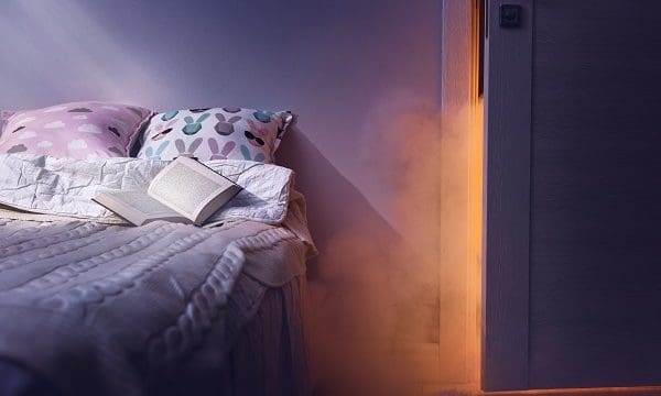 Nightmare after reading. Frightened imagination in the dark of night in bedroom.