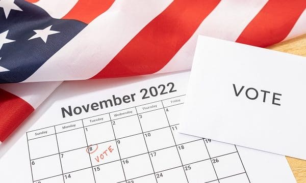 Midterm election Vote Day concept. November 8 2022 calendar marked in red and USA flag
