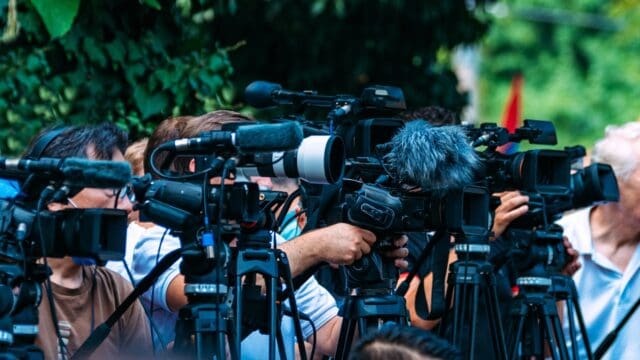 Group of Cameras at an Outdoor Event