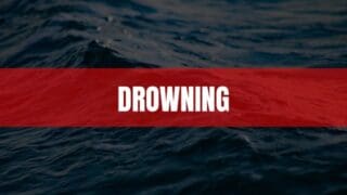 Text that says Drowning on a red rectangle with water in the background
