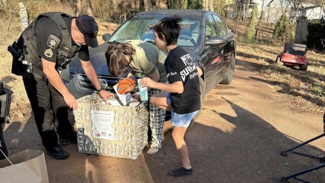 Hall County sheriff's deputies delivered toys and other items Christmas morning to three families in need.  (HCSO photo)