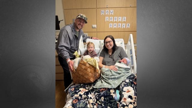 Hudson with parents and sister.  (NGMC Gainesville photo)