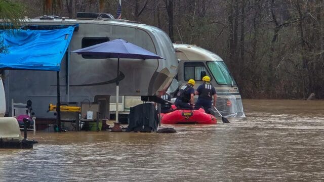 At a camper park on Asbestos Road, where rising floodwaters trapped multiple people inside their campers, White County Fire Service’s swift-water rescue team was deployed. (White Co. Fire Dept photo)