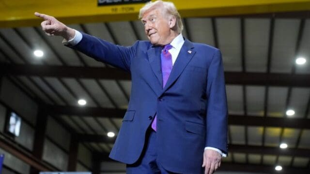 Trump acknowledges the crowd as he prepares to speak in Rome Thursday.  (SRN NEWS/AP photo)