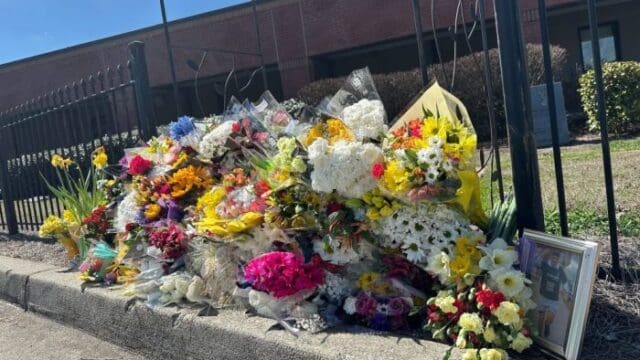 North Hall High School memorial to Hughes. (SRN NEWS/AP photo)