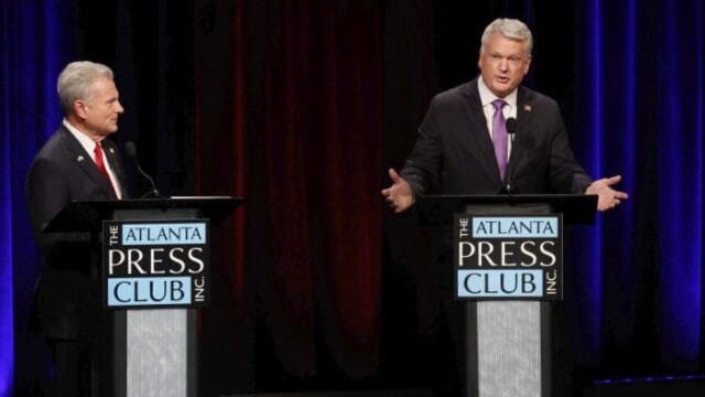 Buddy Cartr, l, and Mac Collins at a recent debate hosted by the Atlanta Press Club.  (SRN NEWS/AP photo)