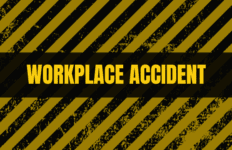 Bold yellow text reading “WORKPLACE ACCIDENT” centered over a black band, with diagonal yellow and black hazard stripes and a distressed grunge texture in the background.